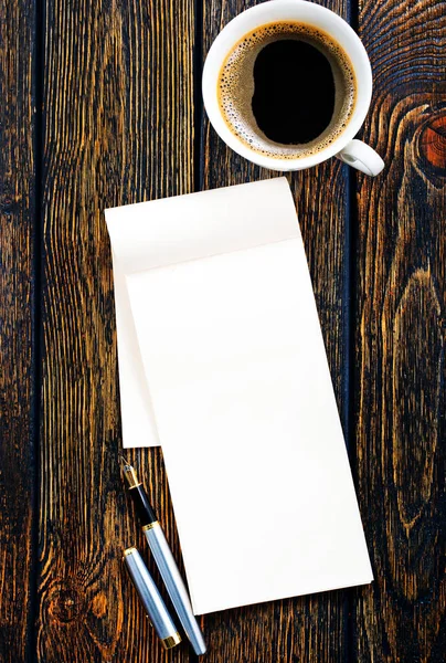 Coffee in cup and paper for note Stock Image