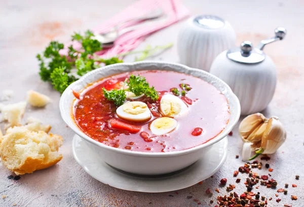 Traditional Ukrainian borscht, red beet soup with boiled eggs on table — Stock Image Traditional Ukrainian Borscht Red Beet Soup Boiled Eggs Table Stock Picture