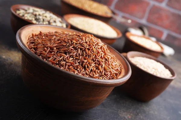 Raw rice, rice in bowl, different kind of rice