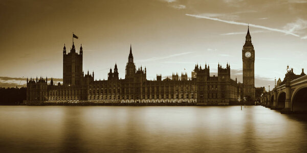 Big Ben and House of Parliament in London at dusk panorama.
