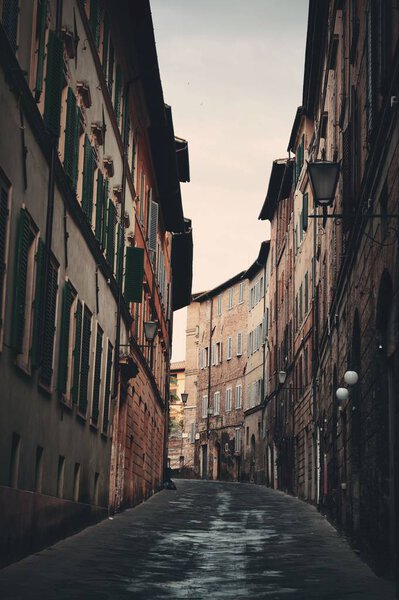 Street view with old buildings in Siena, Italy