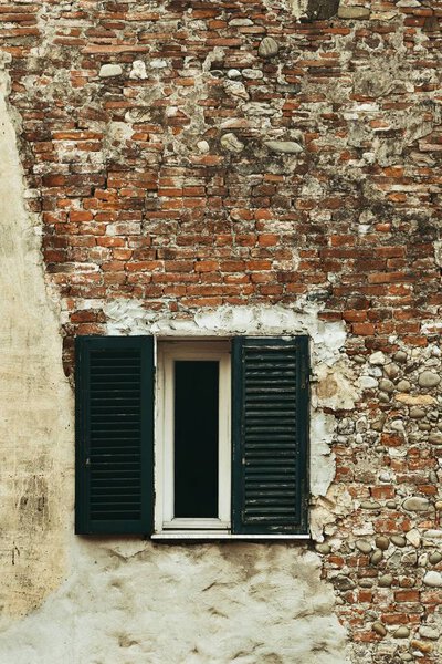 Window in Lucca brick building