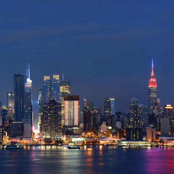 Manhattan midtown skyscrapers and New York City skyline at dusk