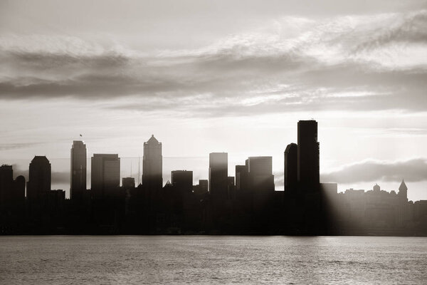 Seattle at sunrise with downtown building silhouettes