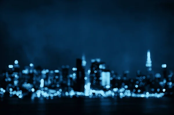 Manhattan bokeh centro da cidade à noite — Fotografia de Stock