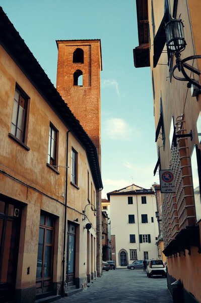 Lucca street view with bell tower in Italy