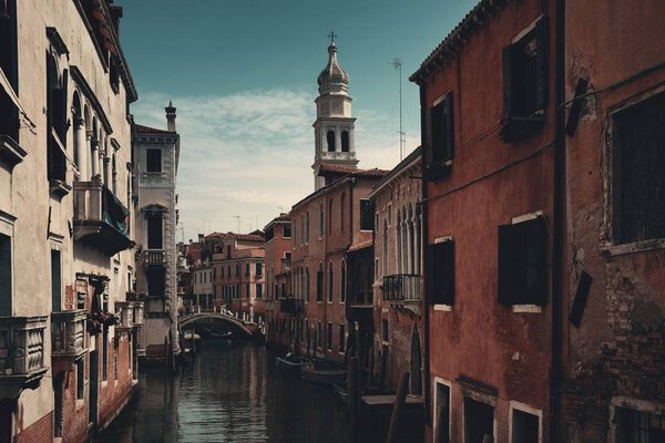 Venice canal view with historical buildings. Italy.