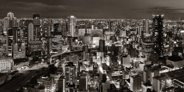 Osaka urban city at night panorama rooftop view. Japan.
