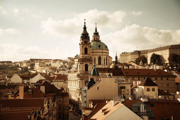Prague skyline rooftop view with church and dome in Czech Republic.
