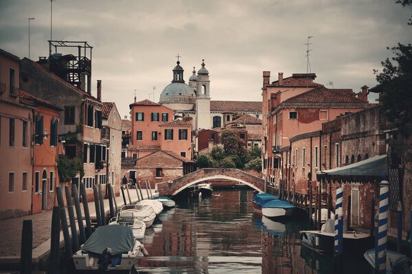 Venice canal view with historical buildings. Italy.