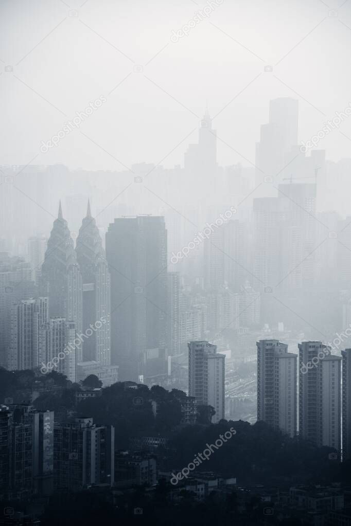 Chongqing urban architecture and city skyline in fog in China