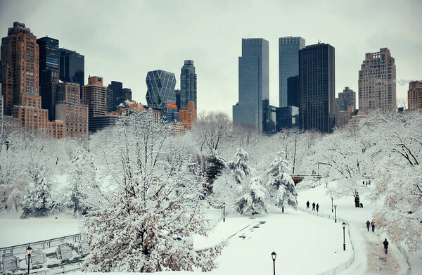 Central Park winter with skyscrapers in midtown Manhattan New York City
