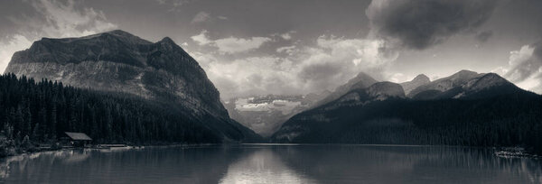 Banff national park Lake Louise sunrise panorama with mountains and forest in Canada.