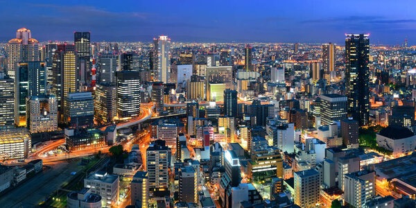 Osaka urban city at night panorama rooftop view. Japan.