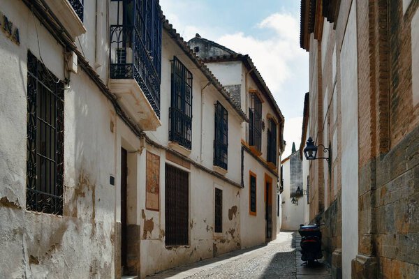 Street view with old buildings in Cordoba, Spain.