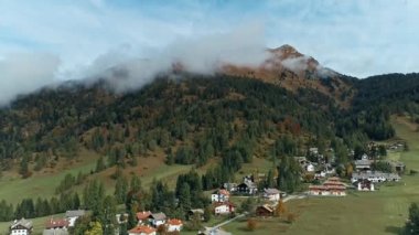 picturesque landscape of village at alpine valley, Dolomites, Italy 