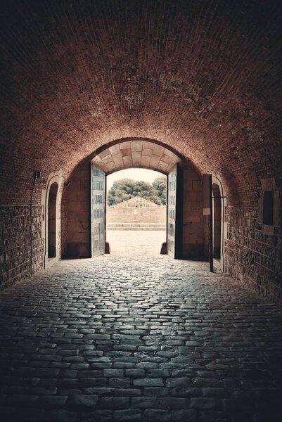 Walkway with arch structure. Castell de Montjuic Fortress in Barcelona, Spain