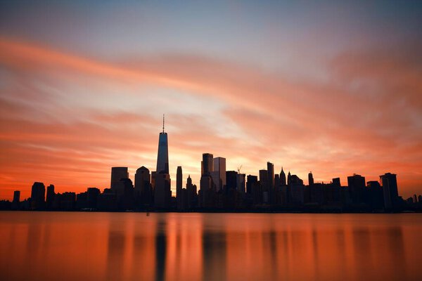 New York City skyline urban view at sunrise with historical architecture