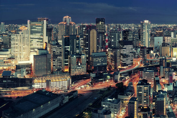 Osaka urban city at night rooftop view. Japan.