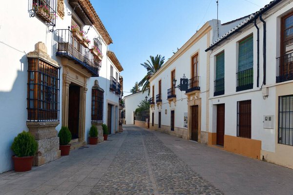Ronda street view with old buildings in Spain.