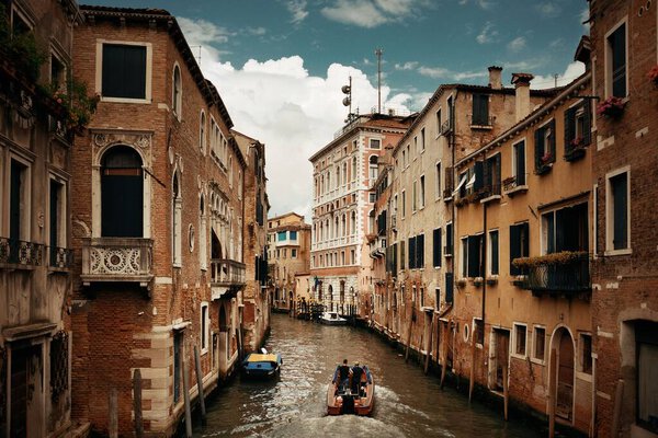 Venice canal view with historical buildings. Italy.