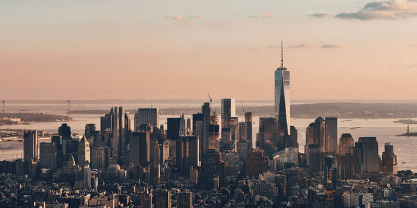 New York City downtown skyline panoramic view at sunset.