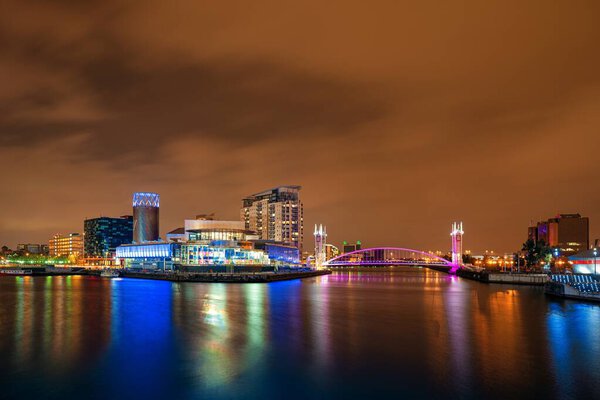 Salford Quays business district at night in Manchester, England, United Kingdom