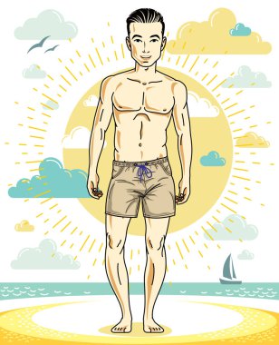 yakışıklı bir adam sahilde