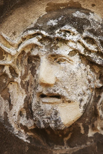 stone statue face of Jesus Christ (fragment)