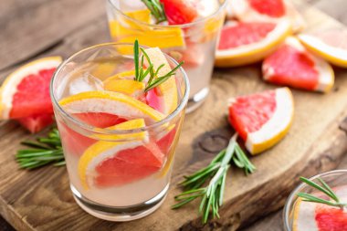 Refreshing drink, grapefruit and rosemary cocktail clipart