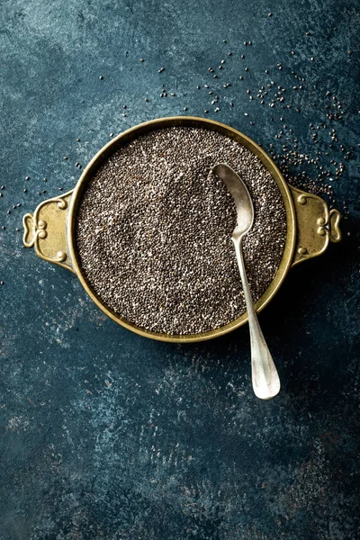 Chia seeds on dark baclground directly above copy space — Stock Photo, Image