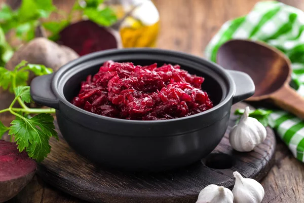 Beetroot salad on wooden background closeup — Stock Photo, Image