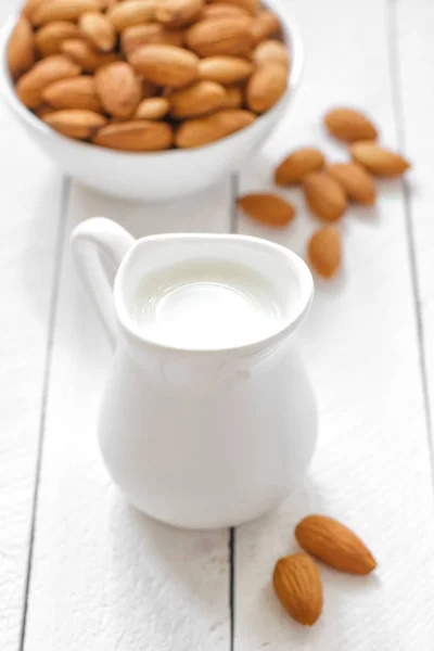 Almond milk and nuts — Stock Photo, Image
