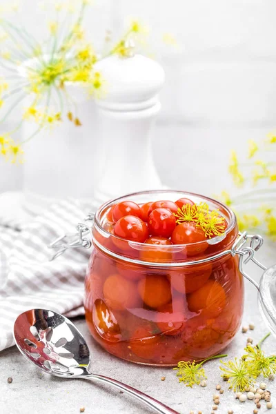 Canned tomatoes in glass jar, marinated tomato — Stock Photo, Image