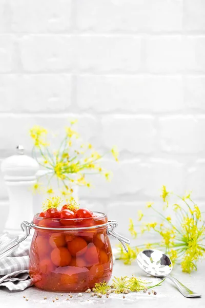 Canned tomatoes in glass jar, marinated tomato — Stock Photo, Image
