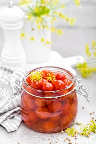 Canned tomatoes in glass jar, marinated tomato — Stock Photo, Image