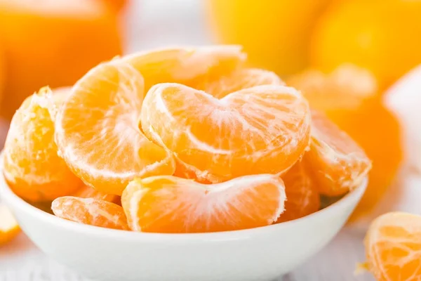 Fresh peeled mandarins, tangerines — Stock Photo, Image