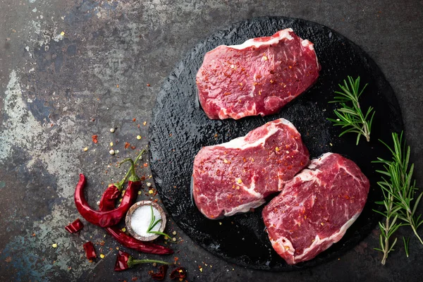 Raw Beef Meat Fresh Steaks Slate Board Black Background Top — Stock Photo, Image