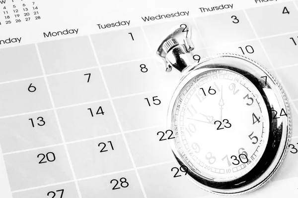 Reloj en calendario —  Fotos de Stock