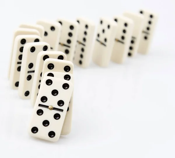 Dominoes in a row — Stock Photo, Image