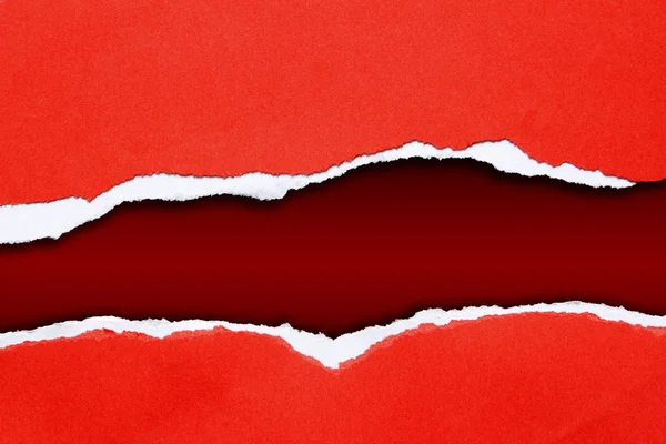 Ripped paper on red — Stock Photo, Image