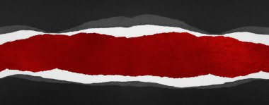 Kırmızı arkaplanda yırtılan delik