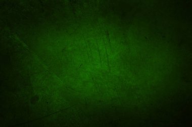 Closeup of green textured wall, dark edge