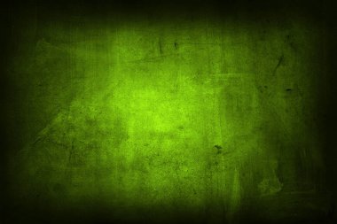 Closeup of green textured wall, dark edge
