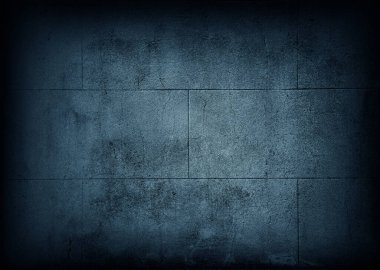 Mavi desenli blok duvarın yakın çekimi. Karanlık kenar