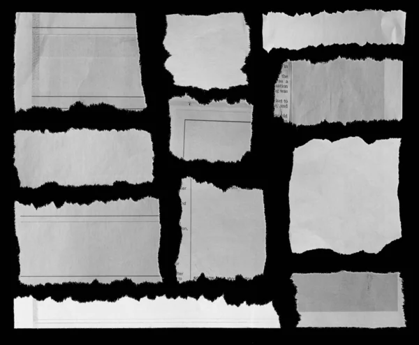 Eleven Pieces Torn Newspaper Black Background — Stock Photo, Image