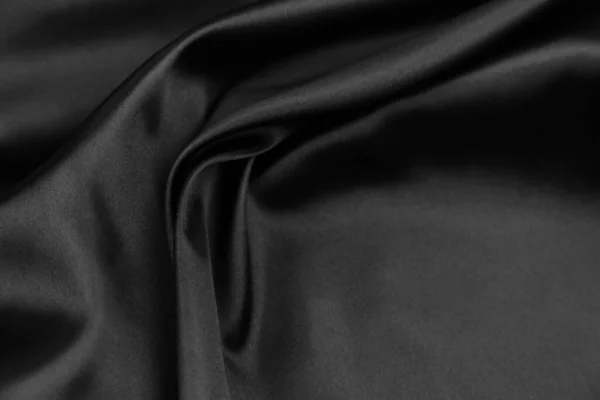 Detailní Záběr Zvlněné Černé Hedvábné Tkaniny — Stock fotografie