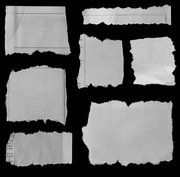 Seven Pieces Torn Newspaper Black Background — Stock Photo, Image