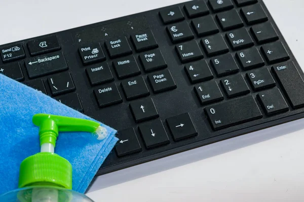 Cleaning and disinfecting the computer keyboard to protect against flu and other viral diseases. Training and working at home during the epidemic.Coronavirus,