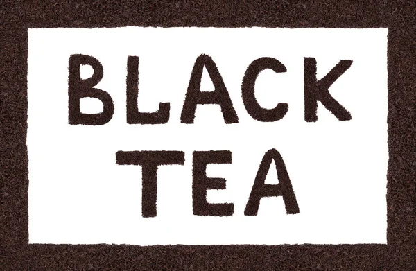 El té negro es la inscripción en el fondo blanco . — Foto de Stock